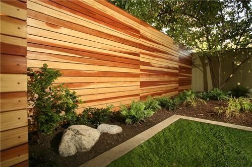 Wooden wall with slats of different shades